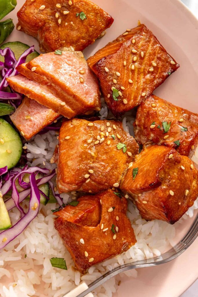 Detailed shot of tender salmon bites on a plate