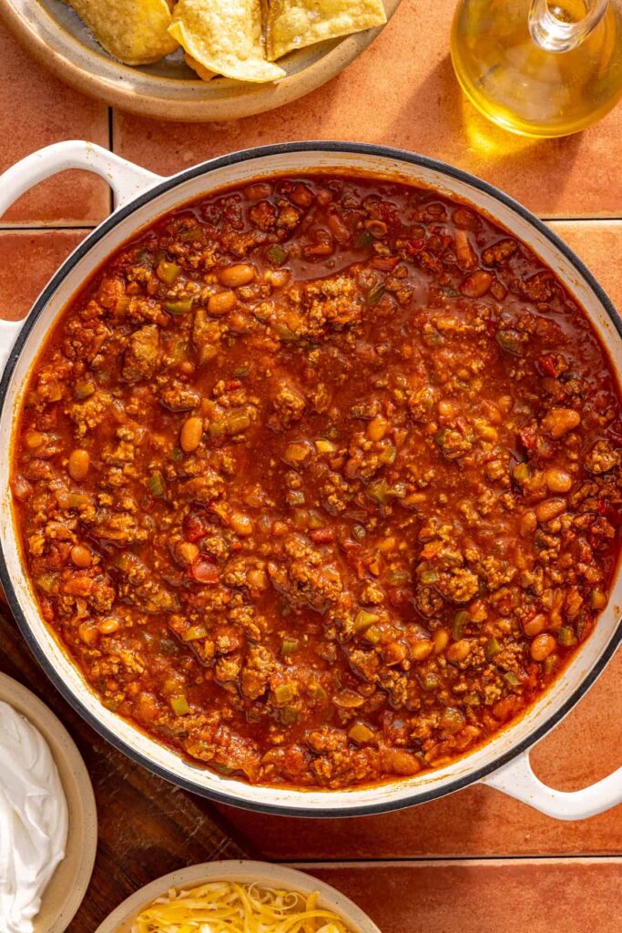 High-protein chili skillet simmering until thick and rich
