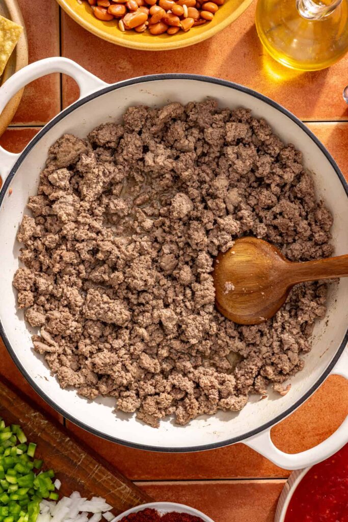 Browning beef and turkey mixture in skillet for high-protein chili