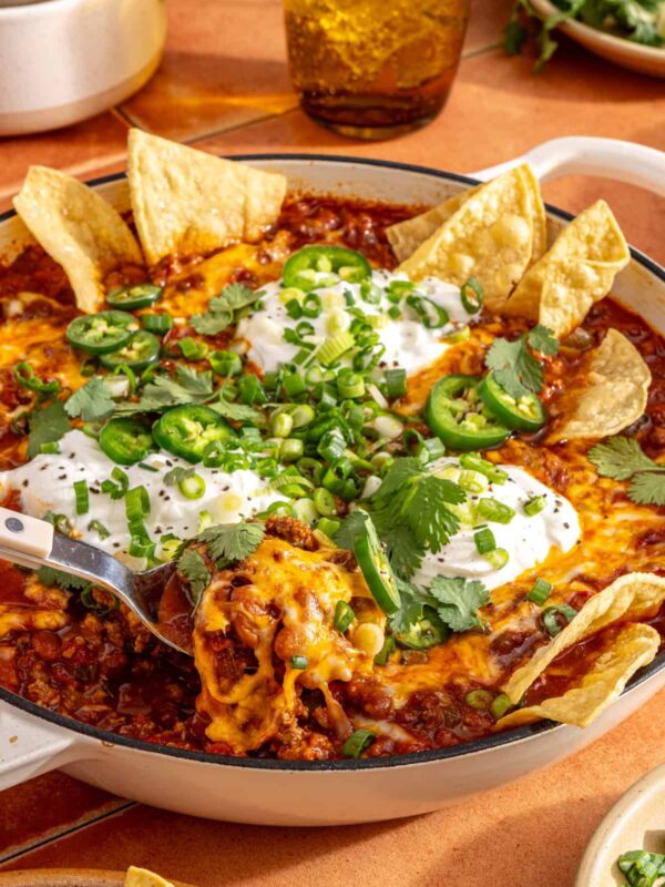 High-protein, high-fiber chili skillet styled with chips and garnishes
