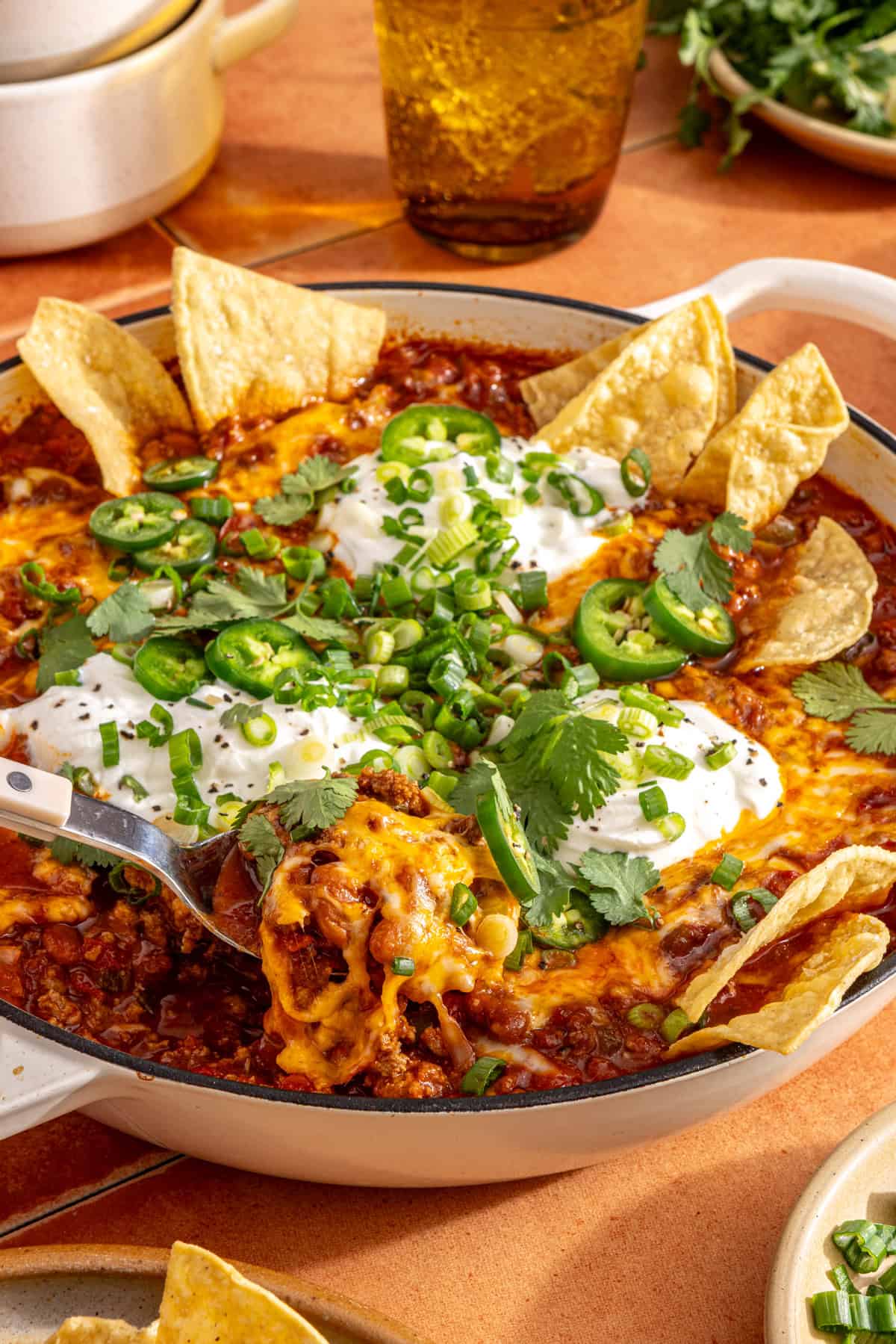 High-protein, high-fiber chili skillet styled with chips and garnishes