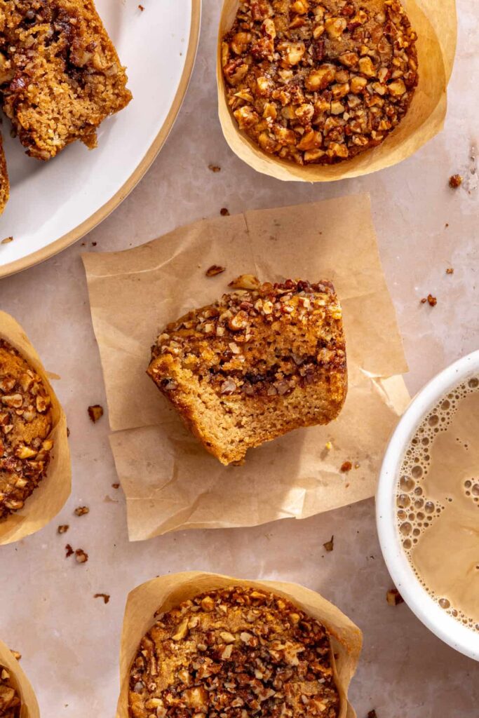 Close view of moist coffee cake muffin with crunchy streusel topping