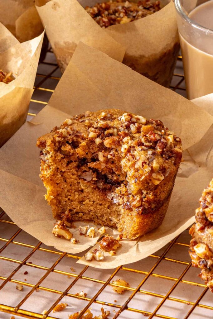 Close-up of moist coffee cake muffin with crunchy streusel topping