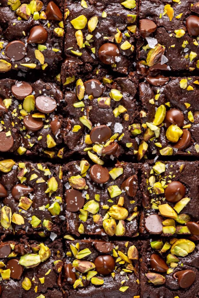 Pistachio brownies scored in pan ready to cut into squares