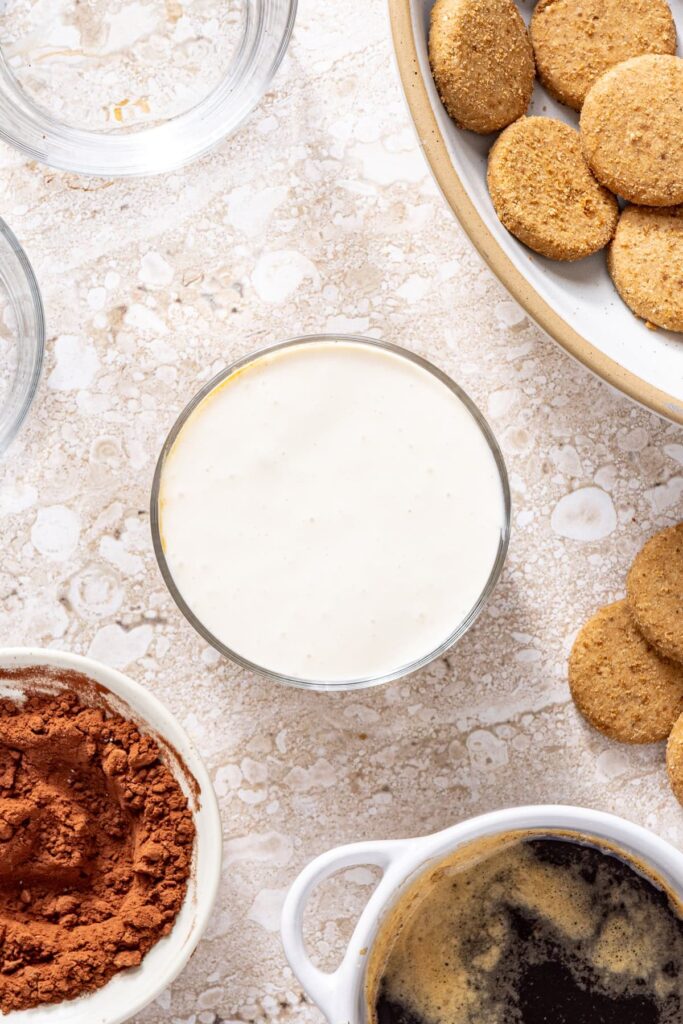 Final layer of creamy tiramisu filling spread evenly