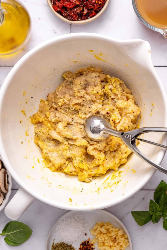 Portioning chicken meatballs for easy one-pan dinner