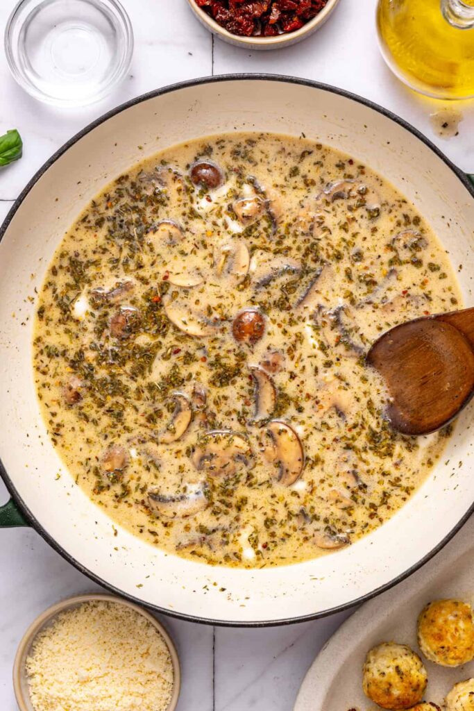 Creating creamy sauce base for marry me chicken meatballs