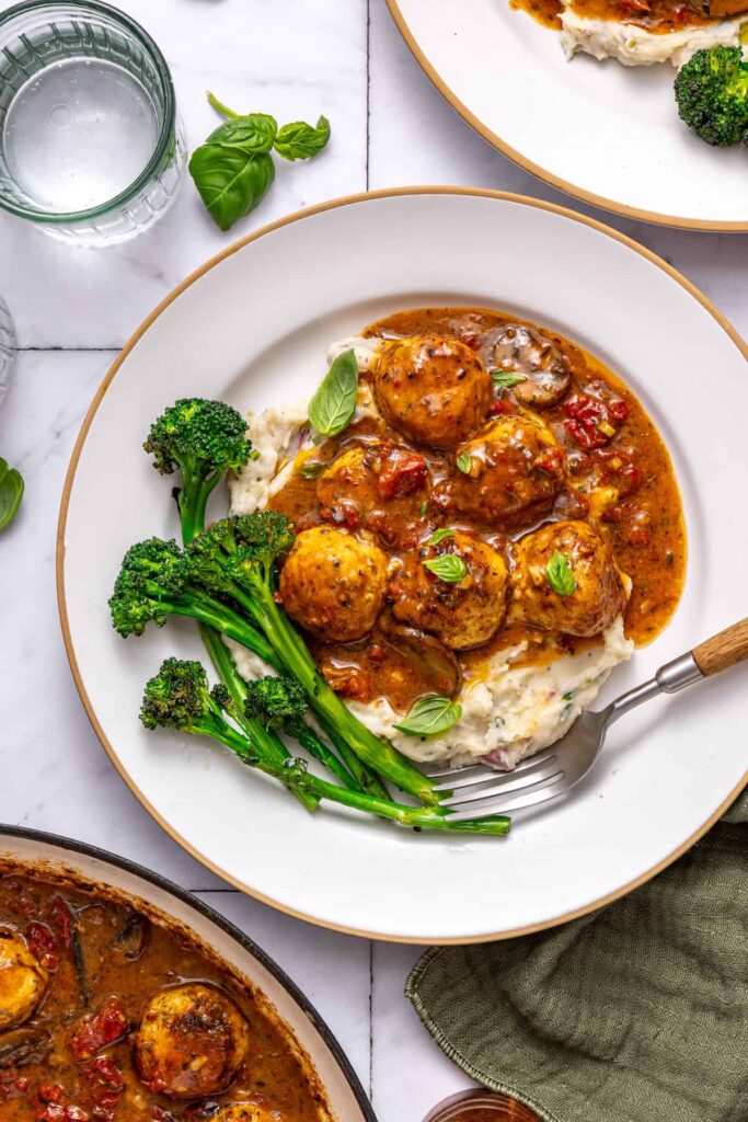 Healthy dinner spread featuring marry me chicken meatballs