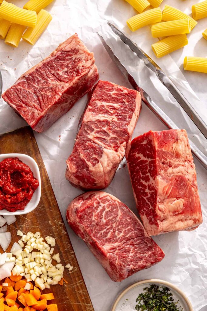 Grass-fed short ribs before being seasoned and cooked for slow cooker short rib ragu