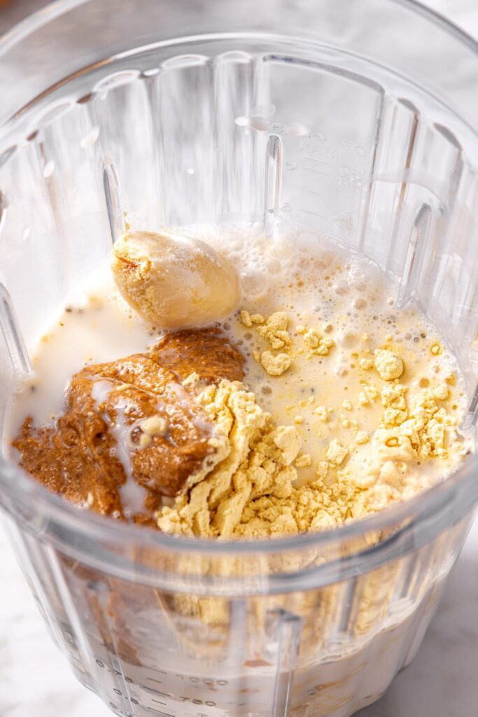 Close-up of smoothie ingredients before blending for a vegan healthy dessert smoothie