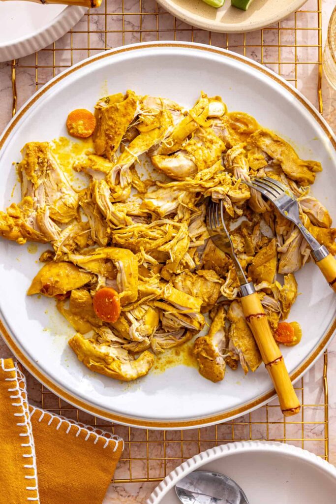 shredding tender chicken for healthy slow cooker chicken curry