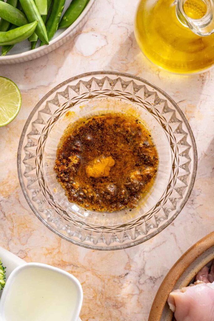 spices mixed with olive oil to make curry paste for slow cooker chicken curry