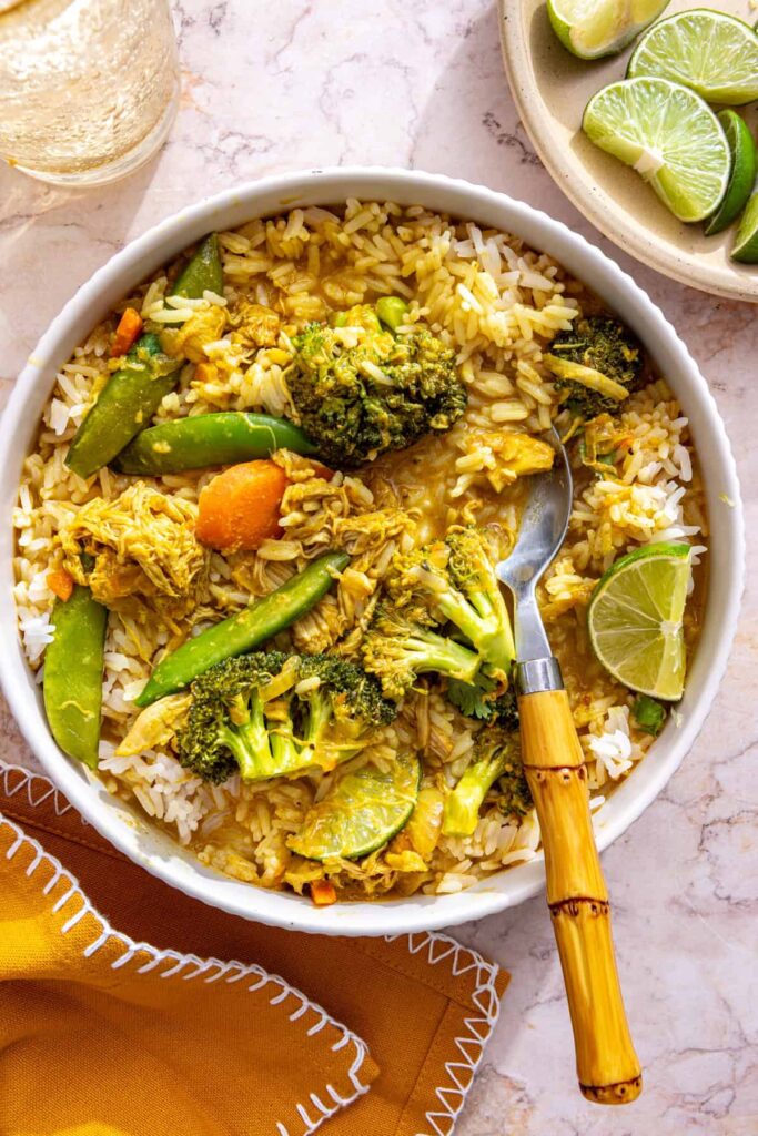 crockpot chicken curry ready to serve on styled table