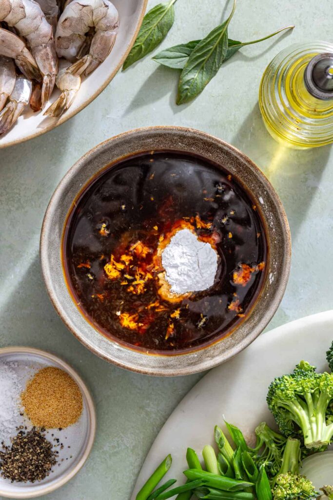 ingredients for homemade shrimp stir fry sauce in a bowl before mixing