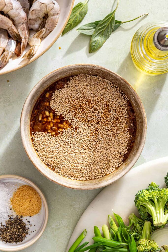 Mixing sauce for shrimp stir fry in a bowl until smooth