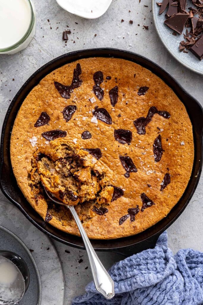 Homemade chocolate chip cookie skillet baked until golden
