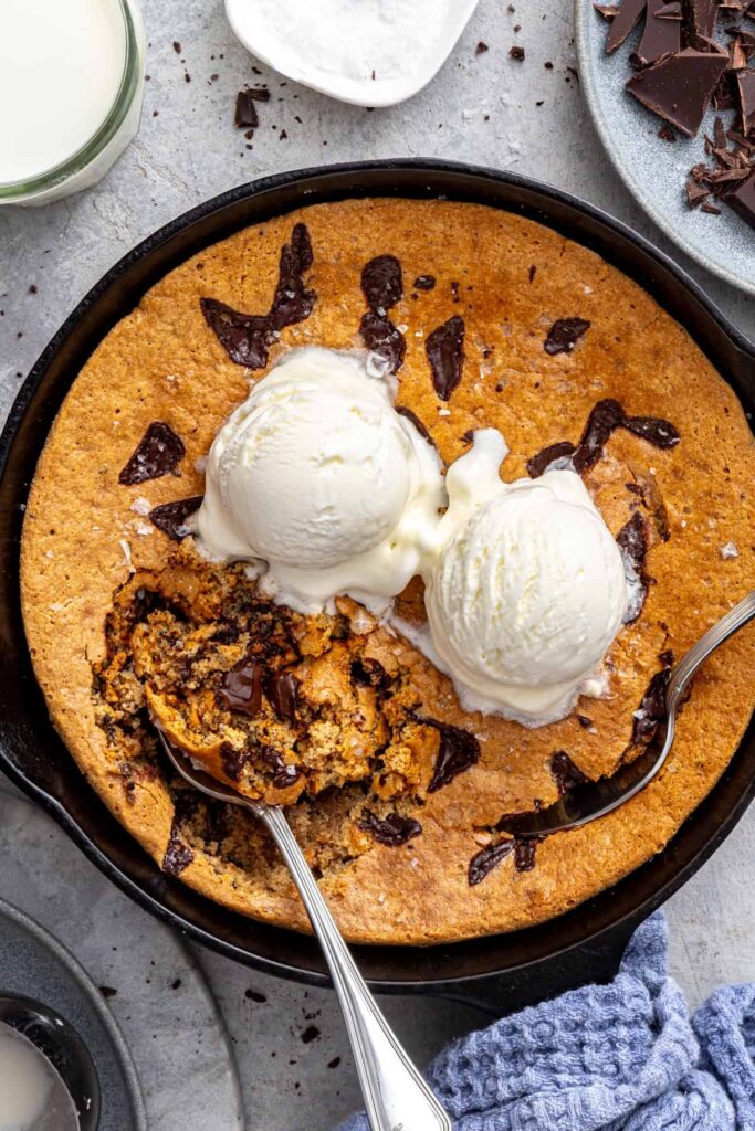 Gooey dairy-free cookie skillet with ice cream on top