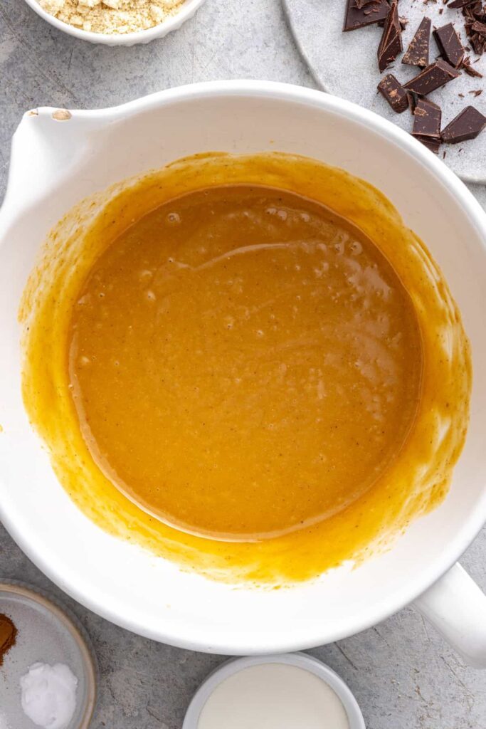 Bowl of wet ingredients for dairy-free chocolate chip cookie skillet
