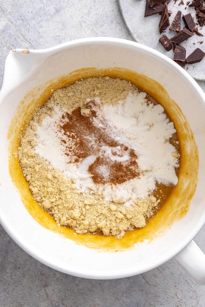 Almond flour and dry ingredients added to chocolate chip cookie skillet batter