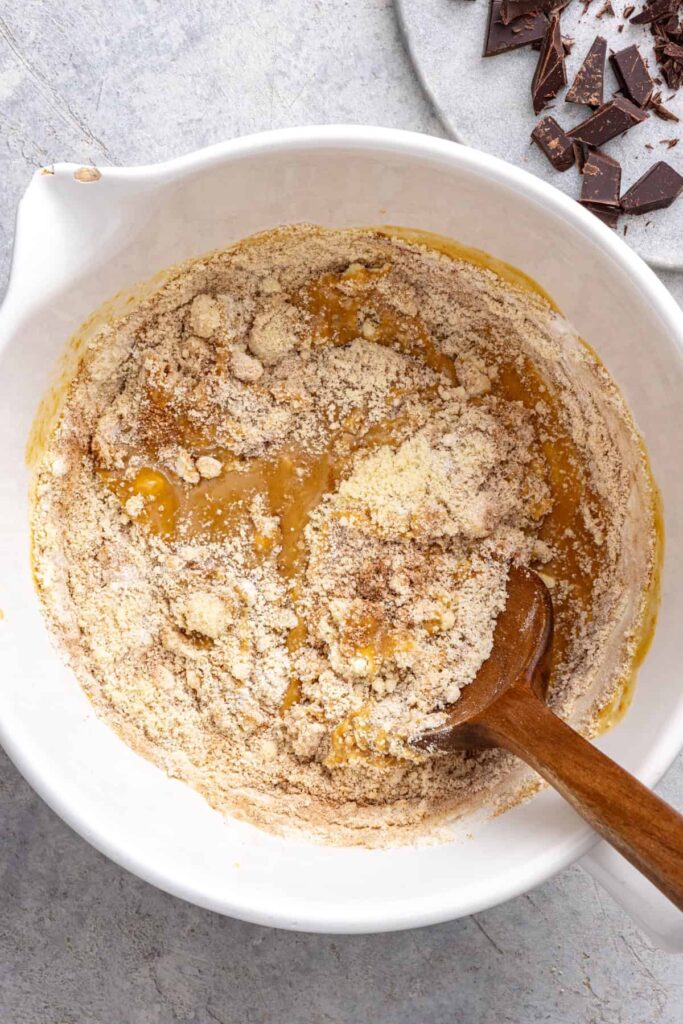 Mixing almond flour into healthy cookie skillet dough