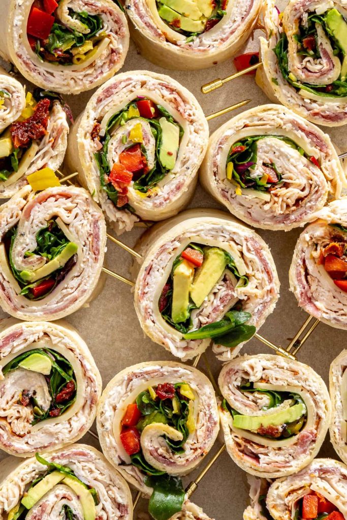 Gluten-free turkey pinwheels with cottage cheese spread and fresh vegetables