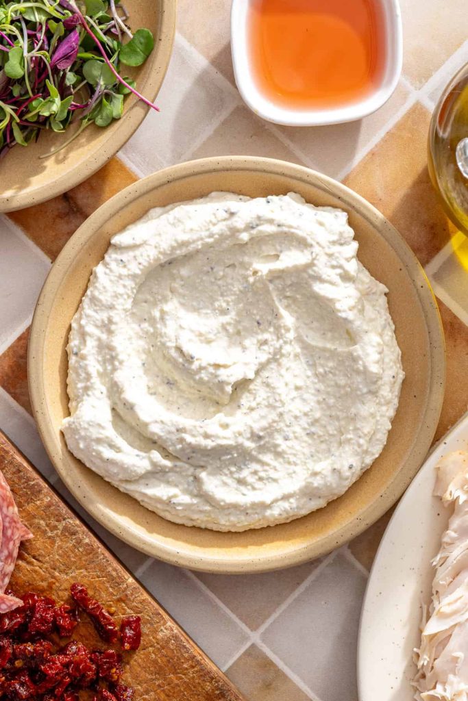 Finished cacio e pepe cottage cheese spread for turkey pinwheels