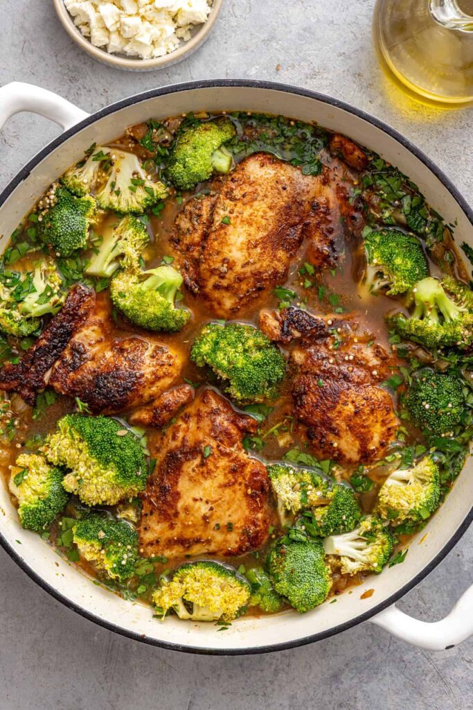 Broccoli and chicken thighs added back into quinoa skillet