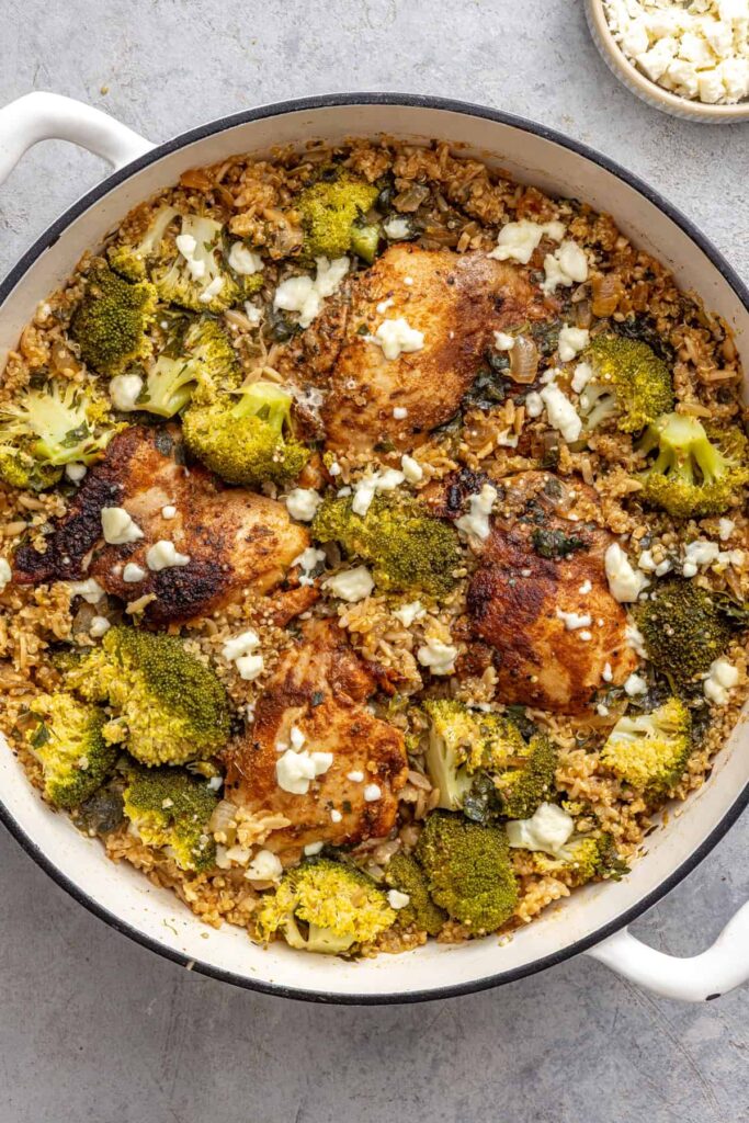 Overhead view of lemon herb chicken quinoa pilaf in a skillet