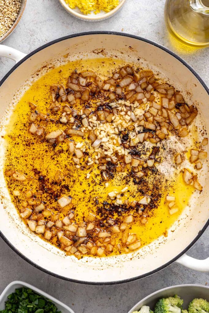 Sautéed onion and garlic base for lemon herb chicken quinoa recipe