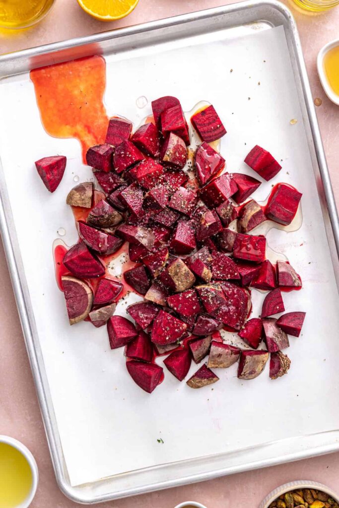 Chopped raw red beets cut into 1-inch pieces for roasted beet salad