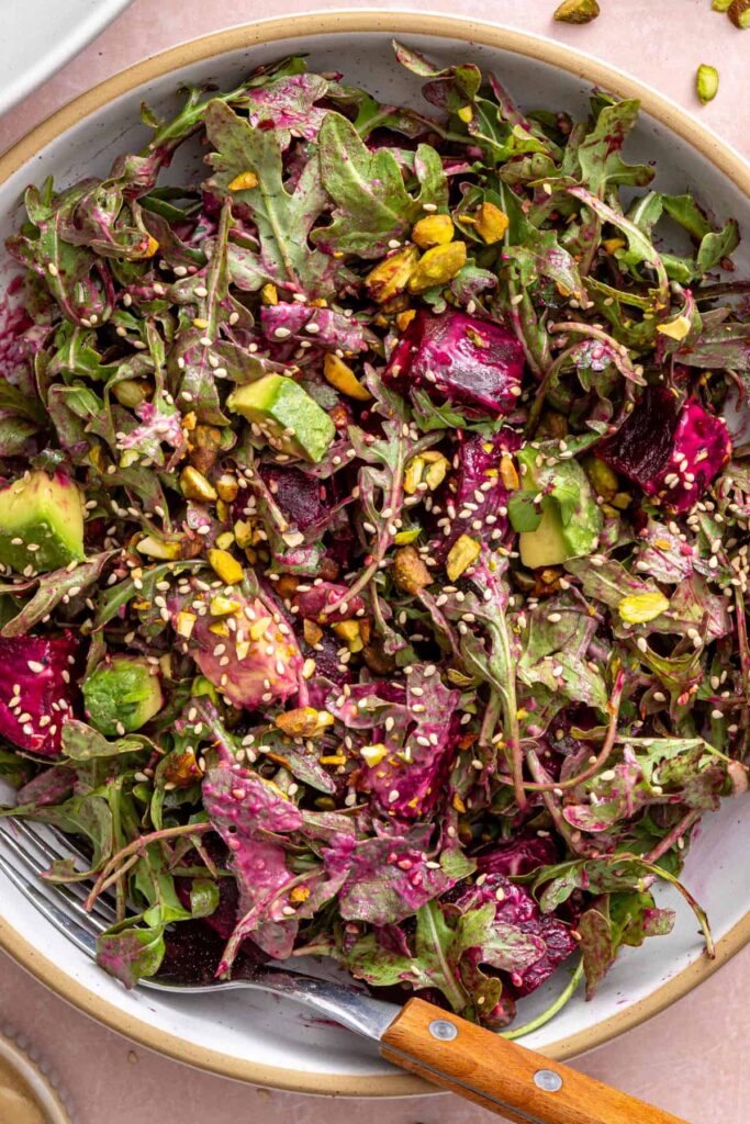 Close-up overhead view of roasted beet salad in a bowl