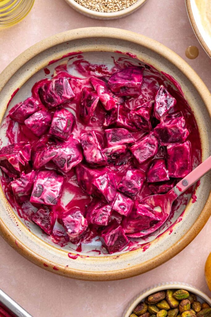 Roasted beets tossed in creamy tahini dressing