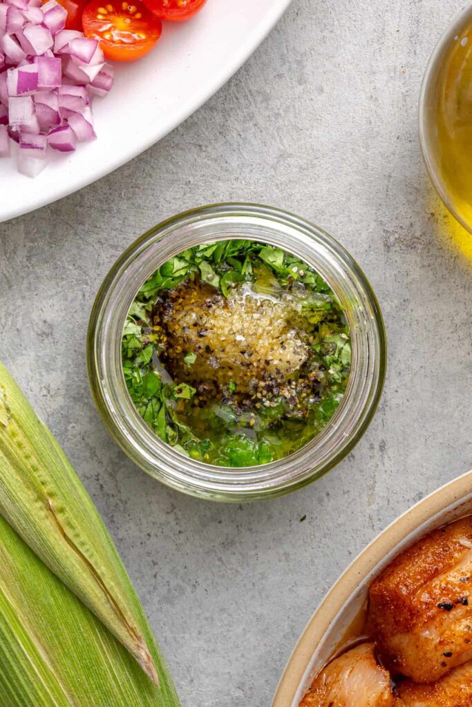 Homemade cilantro lime dressing prepared for charred corn salad