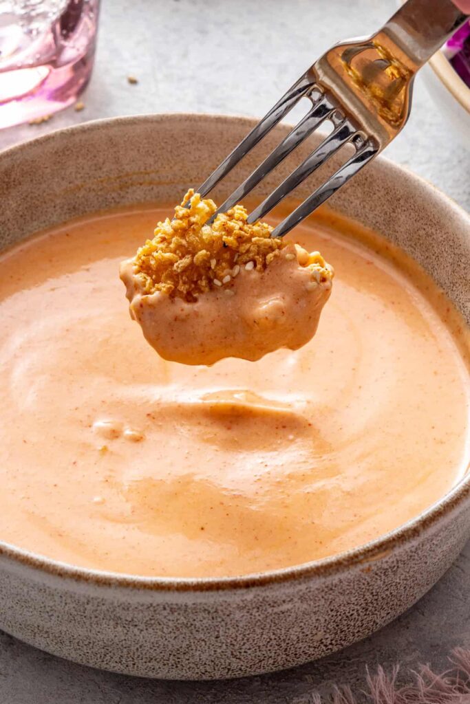 Crunchy air fryer bang bang shrimp coated in creamy homemade dairy-free sauce.