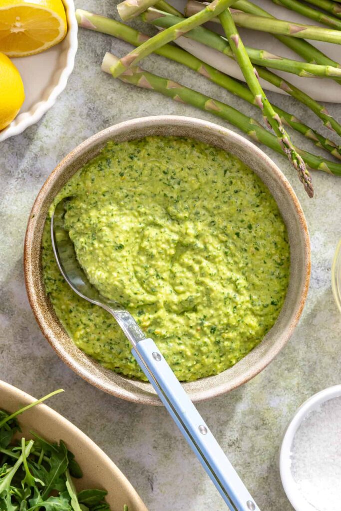 Fresh pesto sauce made with basil, lemon, garlic, and pine nuts