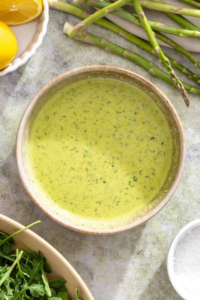Homemade lemon pesto chicken marinade in a bowl