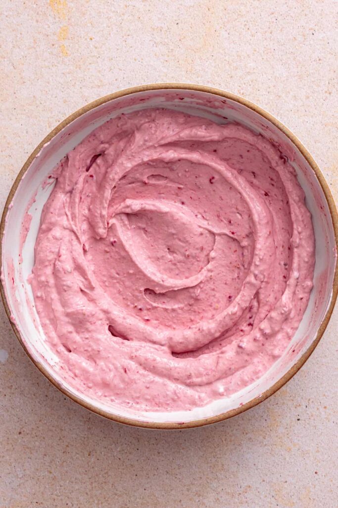 Creamy raspberry yogurt topping for peanut butter and jelly overnight oats