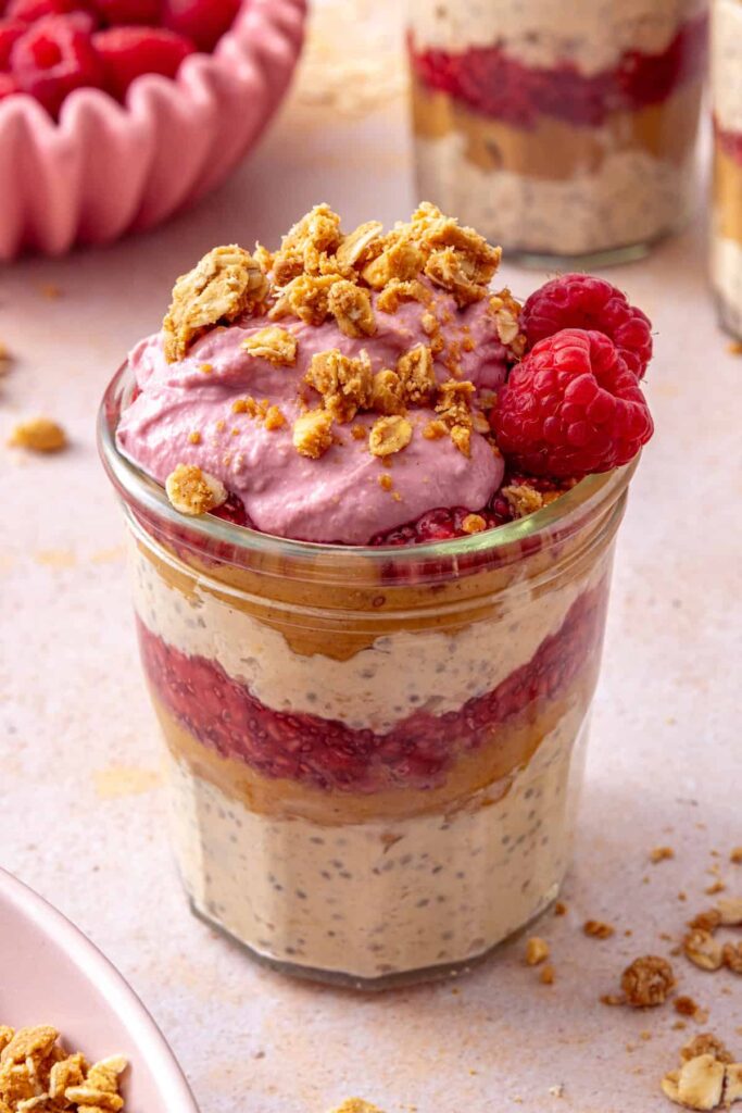 High-protein peanut butter and jelly overnight oats with fresh raspberries