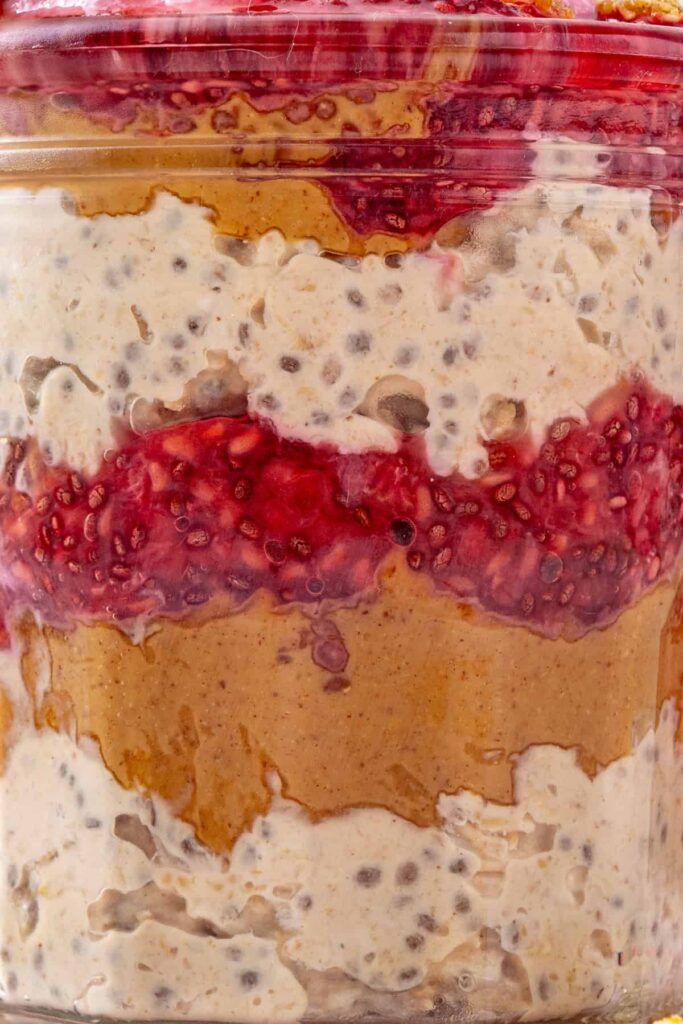 Close-up of the layers in peanut butter and jelly overnight oats