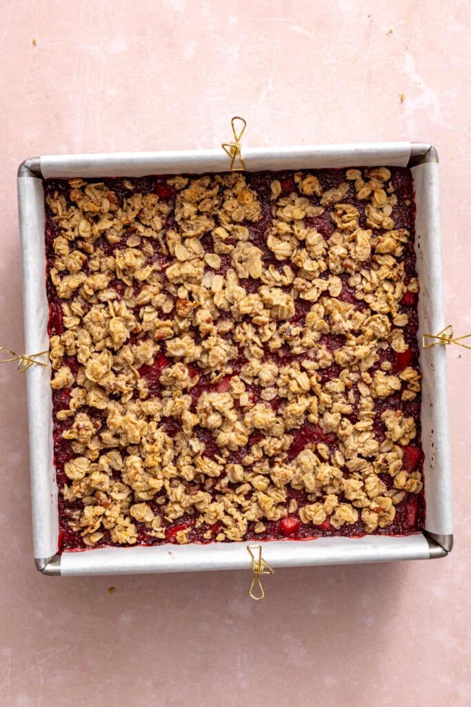Strawberry crumble bars cooling after baking.