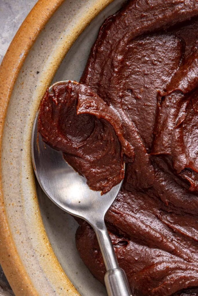 Spoonful of naturally sweetened chocolate frosting