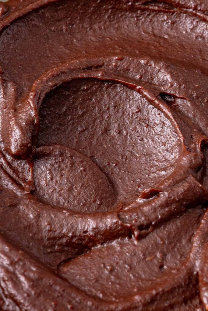 Rich and smooth healthy chocolate frosting made with dates