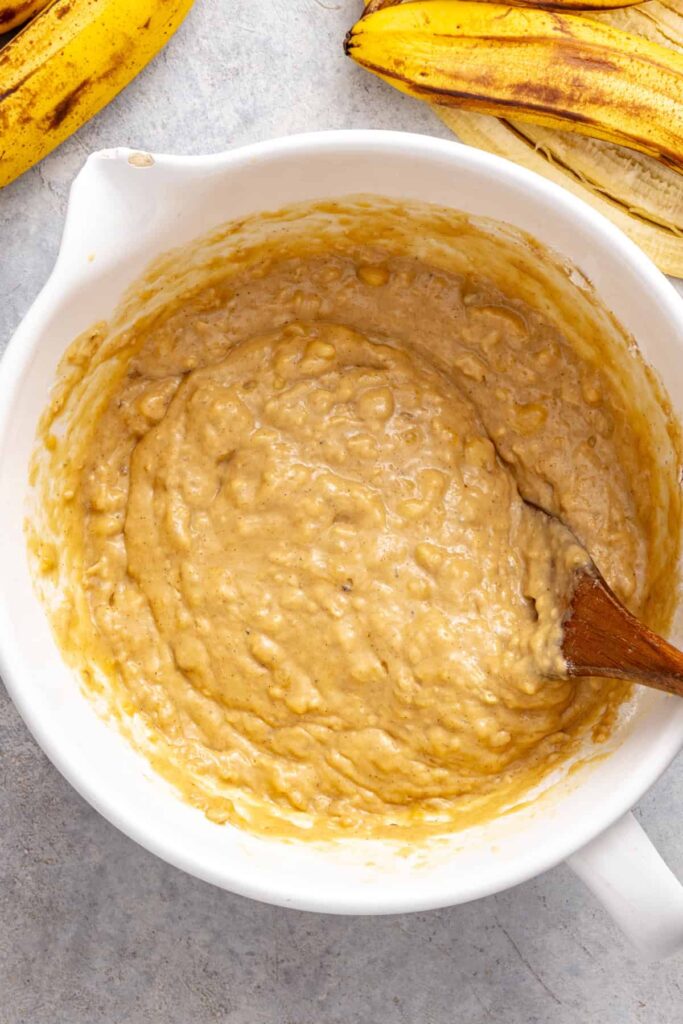 Thick healthy banana birthday cake batter after combining wet and dry ingredients