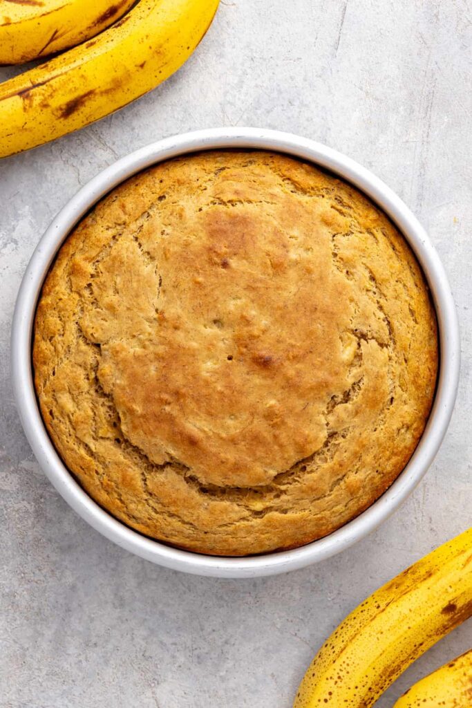 Freshly baked healthy banana birthday cake cooling in pan