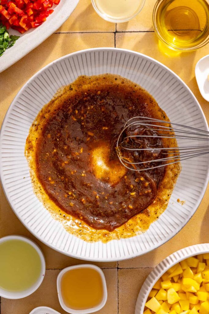 Honey lime marinade whisked together for grilled chicken with fresh lime juice, honey, garlic, and spices