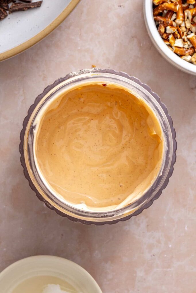 Creamy high-protein peanut butter filling blended for frozen peanut butter pretzel bars.