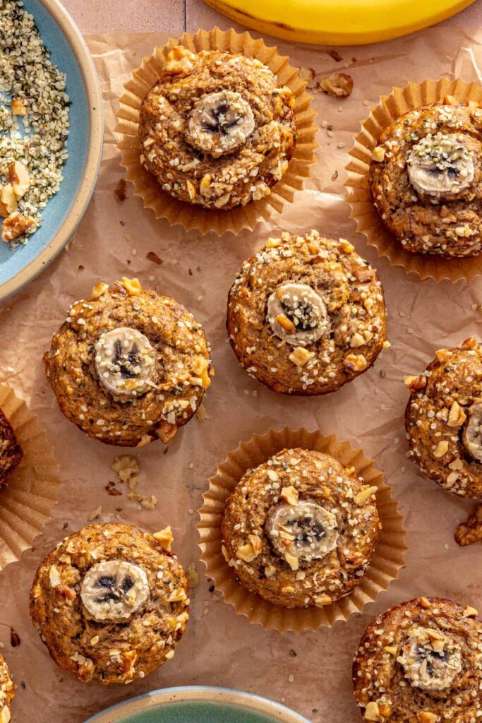 Homemade toddler banana muffins styled with ripe bananas and hemp hearts