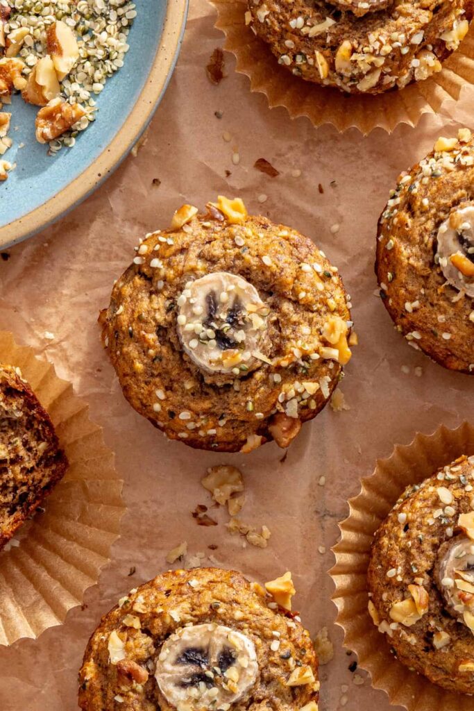 Close-up overhead of a homemade toddler banana muffin with banana slice topping