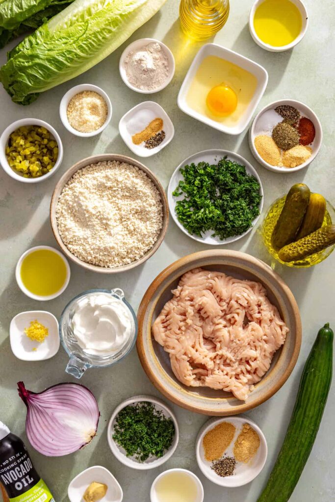 Ingredients for giant dill pickle chicken cutlet with creamy dill salad and pickle ranch
