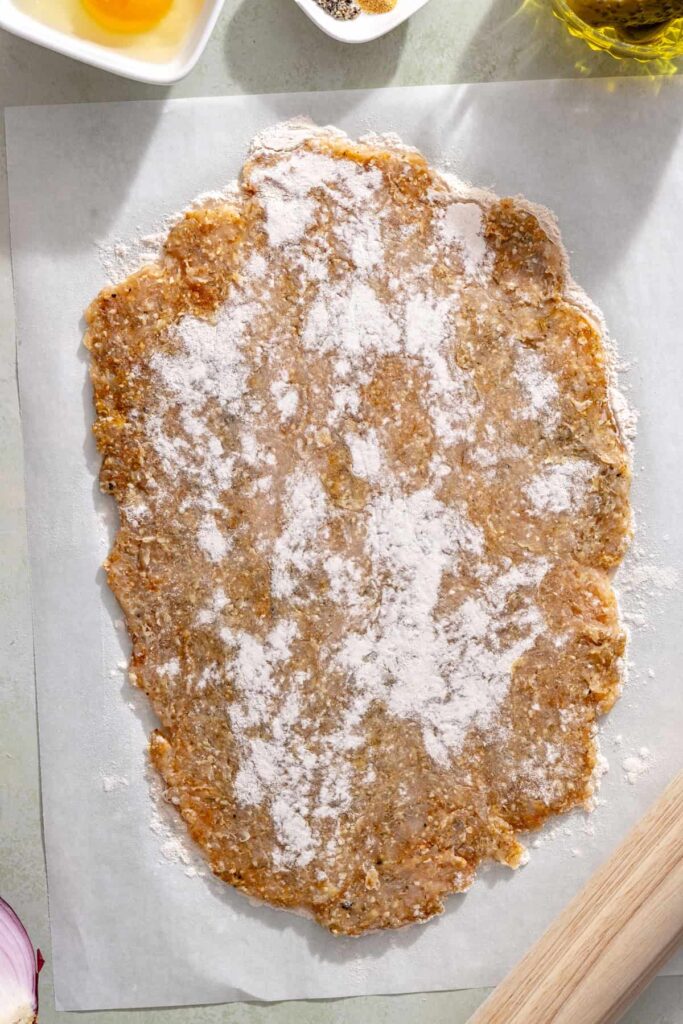 Thin giant dill pickle chicken cutlet ready for breading